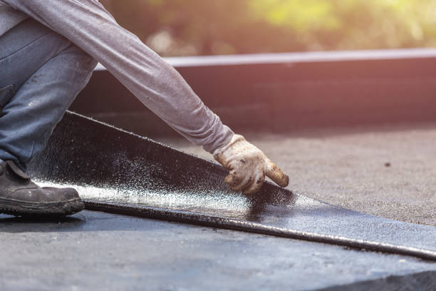 Professional Exterior Waterproofing technician working in Belmont, MI